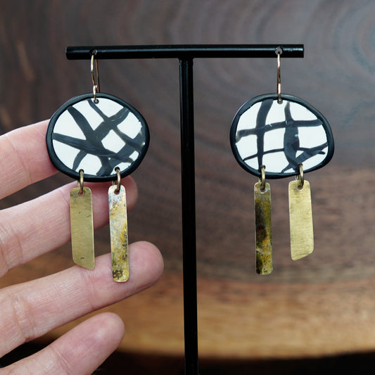 Artful black and white clay and brass patina dangle earrings by Jax Atelier handmade in San Diego