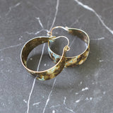 One of a kind brass patina hoop earrings made by Jax Atelier in San Diego